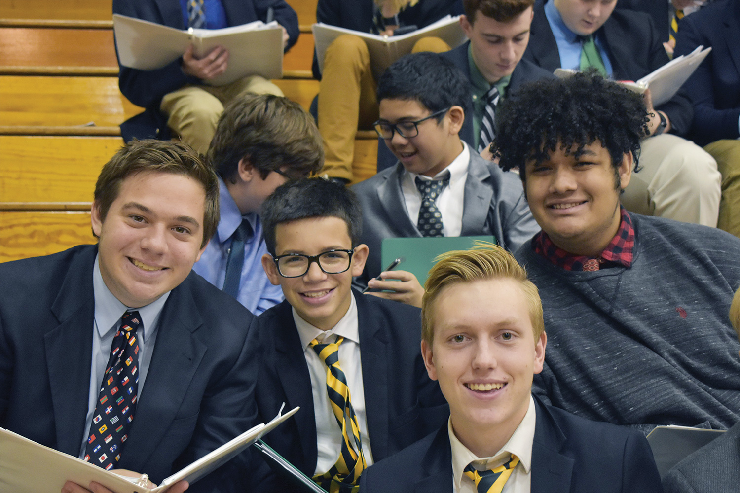 st. edward high school students in the men's choir at mass