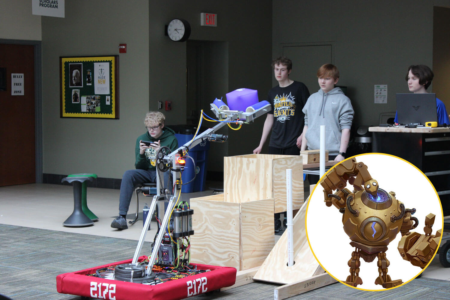 the st. edward high school robotics team working on their robot nicknamed Blitz